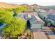 Aerial view of the home showcasing its desert landscaping and tile roof at 10207 W Hedge Hog Pl, Peoria, AZ 85383