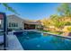 Gorgeous pool and patio area offering a peaceful outdoor retreat with mountain views at 10207 W Hedge Hog Pl, Peoria, AZ 85383