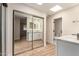 Bright bathroom featuring double vanity, lighted mirrors, and sleek finishes at 10318 E Michigan Ave, Sun Lakes, AZ 85248