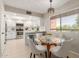 Charming eat-in kitchen features modern appliances, ample counter space, and a cozy dining area at 12222 N Paradise Village S Pkwy # 237, Phoenix, AZ 85032
