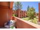 Enjoy green views on the patio with comfortable seating, perfect for relaxing outdoors at 12222 N Paradise Village S Pkwy # 237, Phoenix, AZ 85032