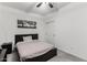 Inviting bedroom offers a ceiling fan, a wall art print and great natural light at 128 S 200Th Ave, Buckeye, AZ 85326