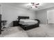 This primary bedroom features a large bed, stylish furniture, and a calming atmosphere at 128 S 200Th Ave, Buckeye, AZ 85326