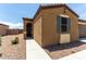 Single-story home featuring front entrance with desert landscaping at 128 S 200Th Ave, Buckeye, AZ 85326