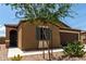 Single-story home featuring low maintenance desert landscaping at 128 S 200Th Ave, Buckeye, AZ 85326