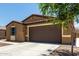 Close up view of a single-story home featuring desert landscaping at 128 S 200Th Ave, Buckeye, AZ 85326