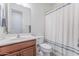 Bathroom with a single sink vanity and shower-tub combo at 13719 W Amberwing St, Peoria, AZ 85383