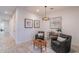 Cozy living room featuring tiled floors, modern furnishings, and decorative accents at 13719 W Amberwing St, Peoria, AZ 85383