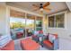 Cozy outdoor seating area with comfortable furniture and a view of the refreshing pool at 13719 W Amberwing St, Peoria, AZ 85383