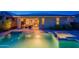Tranquil backyard oasis featuring a stunning pool, relaxing spa, and seamless indoor-outdoor living at 13719 W Amberwing St, Peoria, AZ 85383