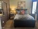 A bedroom features a modern bed with zebra patterned bedding and neutral wall colors at 14000 N 94Th St # 1077, Scottsdale, AZ 85260