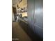 Organized garage with custom cabinets, storage and shelves at 14000 N 94Th St # 1077, Scottsdale, AZ 85260