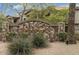 Charming stone sign at Bella Vista community entrance, inviting residents and guests alike at 14000 N 94Th St # 1077, Scottsdale, AZ 85260