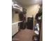 Organized walk-in closet with shelving, drawers, and hanging space, ensuring ample storage and easy access to belongings at 14000 N 94Th St # 1077, Scottsdale, AZ 85260