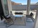 Cozy covered patio with comfortable seating and outdoor rug, perfect for entertaining at 1418 E Jacqueline Pl, Casa Grande, AZ 85122