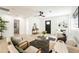 Cozy living room with a modern ceiling fan, neutral color palette, ample light, and great layout at 1425 E Diamond St, Phoenix, AZ 85006
