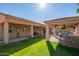 Expansive backyard featuring a patio, a gazebo, a well-maintained lawn, and a sparkling pool at 14372 W Cypress St, Goodyear, AZ 85395