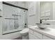 Modern bathroom featuring a sleek tub/shower, stylish fixtures, and clean, bright design at 14372 W Cypress St, Goodyear, AZ 85395