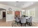 Elegant dining room featuring a round table with seating for six and stylish chandelier at 14372 W Cypress St, Goodyear, AZ 85395