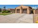 Spacious two-car garage and extended driveway offer plenty of parking for residents and guests at 14372 W Cypress St, Goodyear, AZ 85395