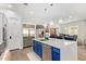 Bright kitchen featuring a large island, stainless steel appliances, and pendant lighting at 14372 W Cypress St, Goodyear, AZ 85395