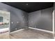 Gray-walled space with a blank canvas ready to be transformed into your dream room at 14372 W Cypress St, Goodyear, AZ 85395