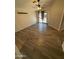 Bedroom with a ceiling fan, neutral walls, and a sliding door leading to the outdoor space at 14602 S 47Th St, Phoenix, AZ 85044