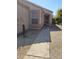 Covered front entryway with desert landscaping providing a charming welcome at 14602 S 47Th St, Phoenix, AZ 85044