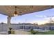 Enjoy your backyard year round on this covered patio overlooking the sparkling pool and fenced in yard at 14826 N 92Nd Pl, Scottsdale, AZ 85260