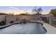 Relax in this pool with a waterfall feature, ideal for unwinding and enjoying the outdoors at 14826 N 92Nd Pl, Scottsdale, AZ 85260