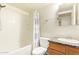 Functional bathroom with a tub-shower combo, vanity with sink, and a mirrored medicine cabinet at 151 E Broadway Rd # 103, Tempe, AZ 85282