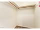 Spacious closet with wood flooring and rods providing ample storage space at 151 E Broadway Rd # 103, Tempe, AZ 85282