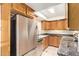 A well-equipped kitchen featuring stainless steel appliances and granite countertops at 151 E Broadway Rd # 103, Tempe, AZ 85282