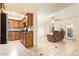 Spacious living area with tile flooring, kitchen view and cozy seating area at 151 E Broadway Rd # 103, Tempe, AZ 85282