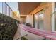 Relaxing patio with hammock and artificial vines creating a serene outdoor escape at 151 E Broadway Rd # 103, Tempe, AZ 85282