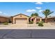 Charming single-story home featuring a two-car garage and low maintenance desert landscaping at 16412 W Peppertree Ct, Surprise, AZ 85387