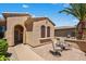 Inviting front patio with comfortable seating, ideal for relaxing and enjoying the outdoors at 16412 W Peppertree Ct, Surprise, AZ 85387