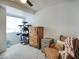 Cozy bedroom with plenty of space for cats, and a comfy, vintage chair at 17032 N 16Th Dr # 8, Phoenix, AZ 85023