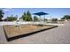 Community playground with shade structure, swings, slides and ample room to play games and socialize at 17032 N 16Th Dr # 8, Phoenix, AZ 85023