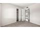 This bedroom features a closet and carpeted floors at 19031 N 13Th Dr, Phoenix, AZ 85027