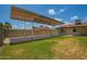 Large, covered carport offering ample parking and protection from the elements at 19031 N 13Th Dr, Phoenix, AZ 85027