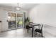 Bright dining area featuring a sliding glass doors to the outdoor living space at 19031 N 13Th Dr, Phoenix, AZ 85027
