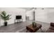 Bright living room with contemporary flooring, neutral paint, and modern decor at 19031 N 13Th Dr, Phoenix, AZ 85027
