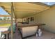 Covered patio with custom bar area, great for hosting guests at 19031 N 13Th Dr, Phoenix, AZ 85027
