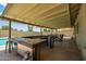 Covered patio with custom bar area, perfect for entertaining at 19031 N 13Th Dr, Phoenix, AZ 85027