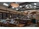 Community library featuring extensive bookshelves, comfortable seating, and ample natural lighting at 1955 Leisure World --, Mesa, AZ 85206