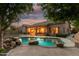 Backyard featuring a sparkling pool, covered patio, and ample space for outdoor entertaining at 1963 E Monterey St, Chandler, AZ 85225