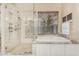 Luxurious bathroom with a walk-in shower, soaking tub, and serene natural light at 1963 E Monterey St, Chandler, AZ 85225