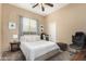 A cozy bedroom features a queen-sized bed, soft lighting, and a soothing color palette creating a relaxing atmosphere at 1963 E Monterey St, Chandler, AZ 85225