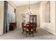Dining room with formal table, chandelier, hutch, and neutral colored carpet at 1963 E Monterey St, Chandler, AZ 85225